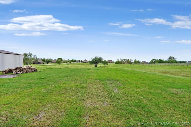view of yard featuring a rural view