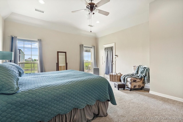bedroom with baseboards, multiple windows, carpet floors, and visible vents