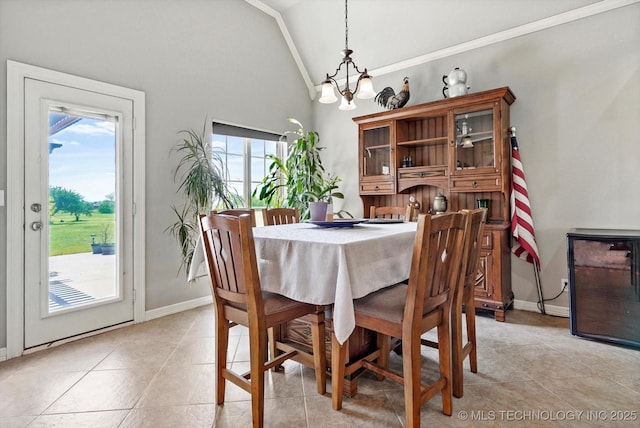 dining area featuring baseboards, an inviting chandelier, and light tile patterned floors