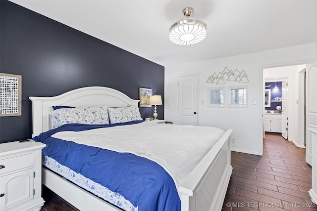 bedroom featuring dark wood-type flooring