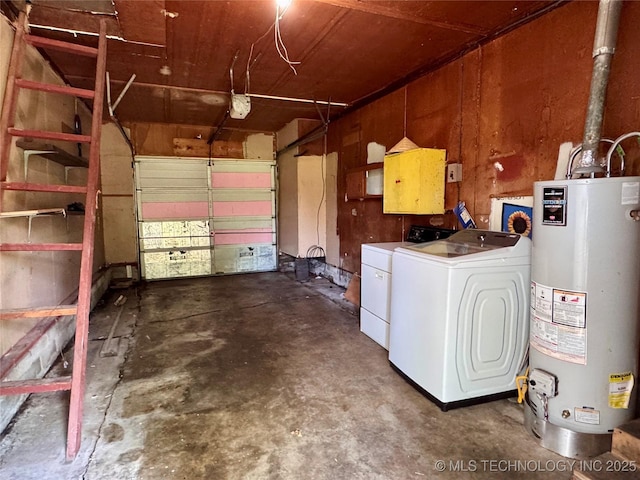 garage with gas water heater, separate washer and dryer, and a garage door opener
