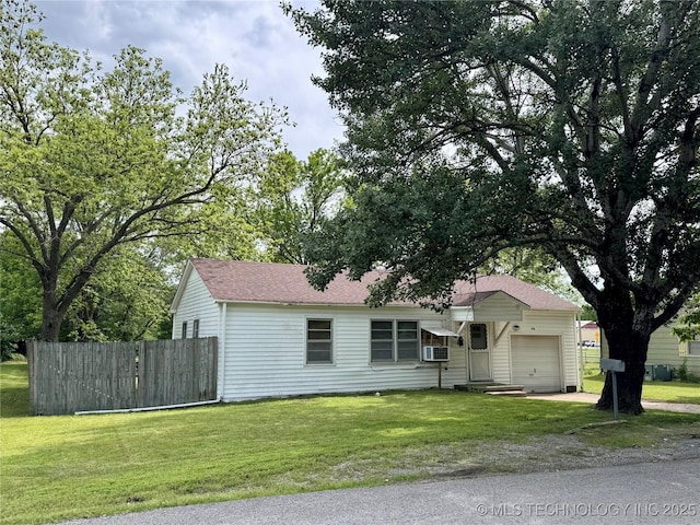 ranch-style house featuring an attached garage, driveway, cooling unit, and roof with shingles