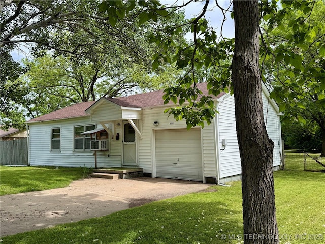 view of front facade featuring a garage, driveway, roof with shingles, and cooling unit