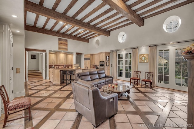 2119 E 30th Pl, Tulsa, OK 74114 - living room featuring french doors, recessed lighting, baseboards, a towering ceiling, and beam ceiling