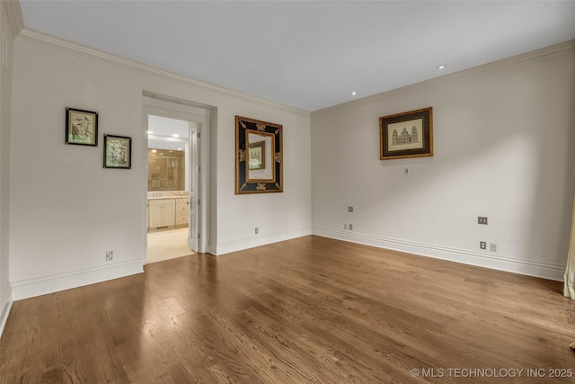 2119 E 30th Pl, Tulsa, OK 74114 - unfurnished room featuring crown molding, wood finished floors, and baseboards