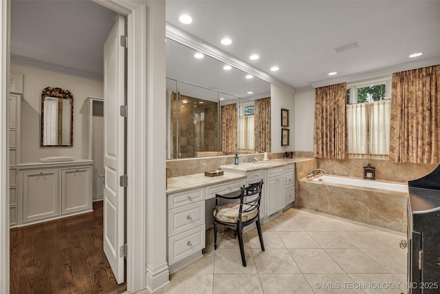 2119 E 30th Pl, Tulsa, OK 74114 - full bathroom featuring recessed lighting, walk in shower, a garden tub, vanity, and crown molding
