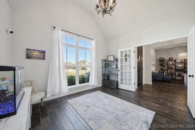 10431 S 232nd E Ave, Broken Arrow, OK 74014 - living area featuring a chandelier, high vaulted ceiling, dark wood-type flooring, and french doors
