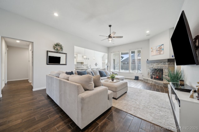 10431 S 232nd E Ave, Broken Arrow, OK 74014 - living area featuring ceiling fan, dark wood-type flooring, baseboards, recessed lighting, and a fireplace