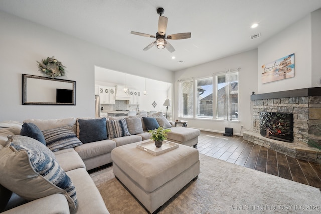 10431 S 232nd E Ave, Broken Arrow, OK 74014 - living area with a ceiling fan, wood finished floors, a fireplace, baseboards, and recessed lighting