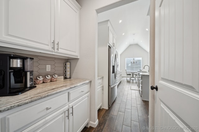 10431 S 232nd E Ave, Broken Arrow, OK 74014 - kitchen featuring stainless steel refrigerator with ice dispenser, white cabinetry, backsplash, recessed lighting, and dark wood-type flooring