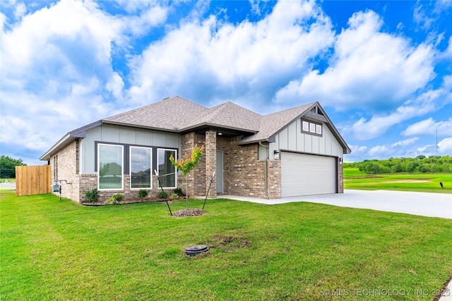 10914 S 272nd E Ave, Coweta, OK 74429 - view of front of property featuring board and batten siding, driveway, brick siding, a garage, and a shingled roof