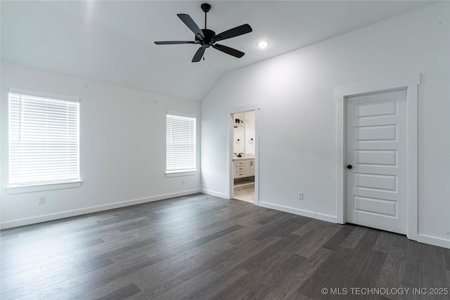10914 S 272nd E Ave, Coweta, OK 74429 - unfurnished bedroom with dark wood-style floors, lofted ceiling, multiple windows, ensuite bath, and recessed lighting