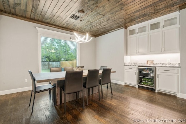 dining room with wooden ceiling, beverage cooler, ornamental molding, an inviting chandelier, and visible vents