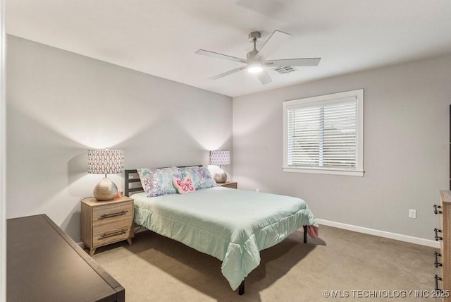 bedroom with light colored carpet, baseboards, a ceiling fan, and visible vents
