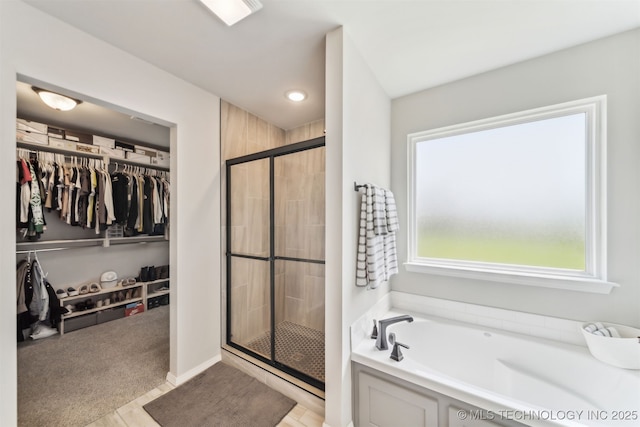 3494 E 155th St S, Bixby, OK 74008 - full bathroom featuring a stall shower, a spacious closet, a bath, and recessed lighting