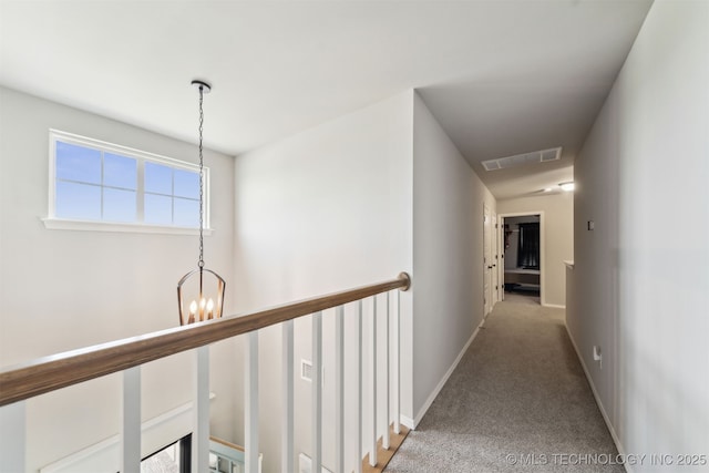 3494 E 155th St S, Bixby, OK 74008 - corridor with a chandelier, carpet, baseboards, and an upstairs landing