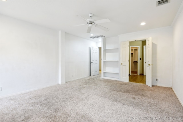 unfurnished bedroom with carpet flooring, recessed lighting, baseboards, and a ceiling fan