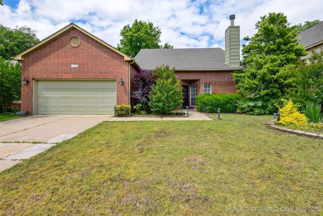 view of front of property with brick siding, driveway, a front lawn, a chimney, and a garage