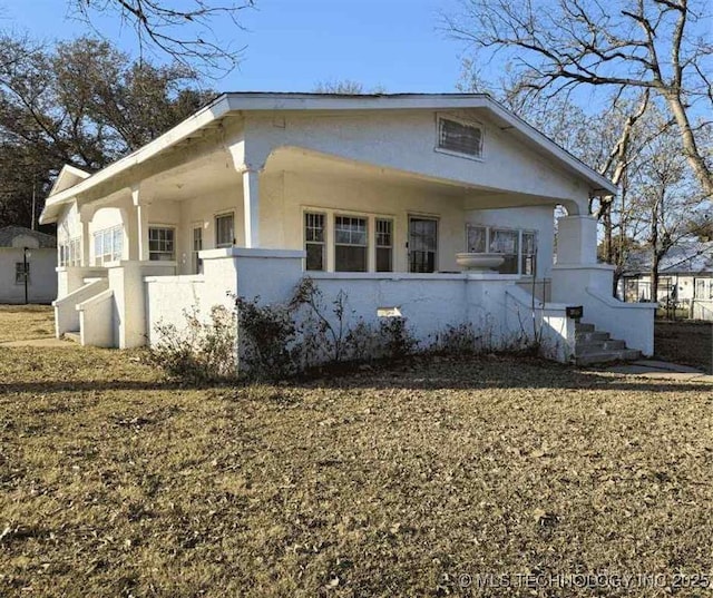 view of front of home featuring stucco siding