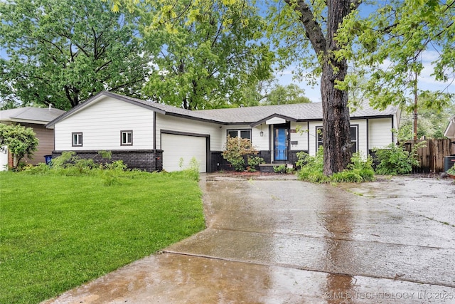 1610 E 55th Pl, Tulsa, OK 74105 - ranch-style home with concrete driveway, a garage, and central AC