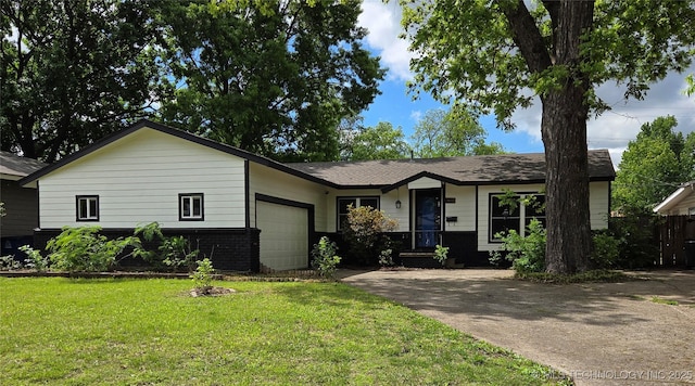 1610 E 55th Pl, Tulsa, OK 74105 - ranch-style house with an attached garage, a front yard, concrete driveway, and brick siding
