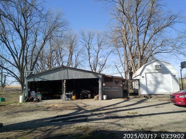view of outbuilding featuring an outdoor structure