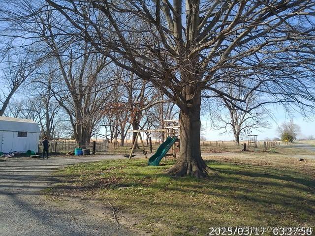 view of yard featuring a playground