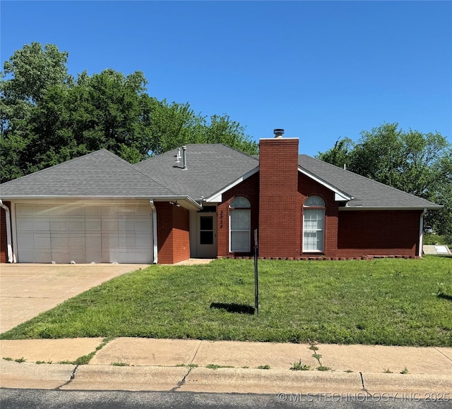3926 W 15th Ave, Stillwater, OK 74074 - single story home with brick siding, an attached garage, driveway, a front lawn, and a chimney