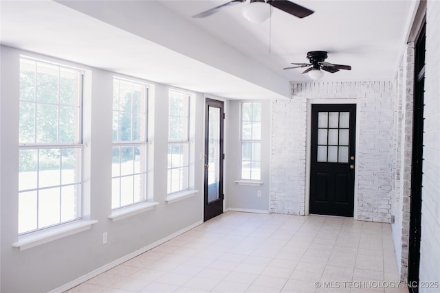 3926 W 15th Ave, Stillwater, OK 74074 - foyer with a ceiling fan, baseboards, and tile patterned flooring