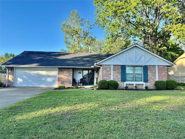 606 Rosewood Ct, Claremore, OK 74017 - ranch-style house with an attached garage, brick siding, driveway, and a front yard