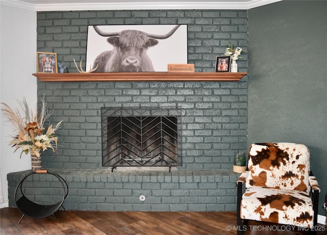 606 Rosewood Ct, Claremore, OK 74017 - detailed view of crown molding, wood finished floors, and a fireplace