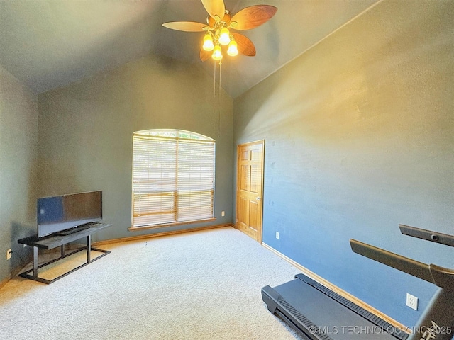 workout area featuring carpet, baseboards, ceiling fan, and high vaulted ceiling