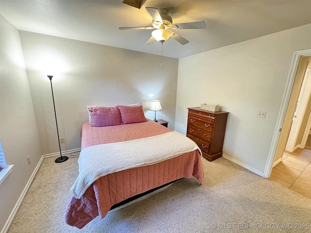 bedroom with light carpet, baseboards, and ceiling fan