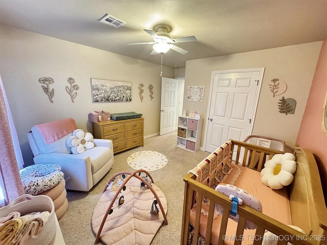 bedroom featuring ceiling fan, light carpet, and visible vents