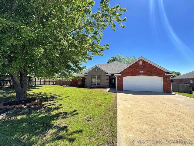 ranch-style house with concrete driveway, a front yard, a garage, and fence