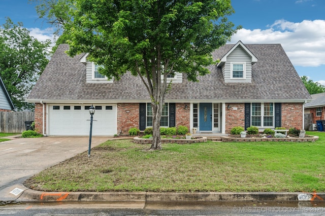 4721 S Irvington Pl, Tulsa, OK 74135 - cape cod house featuring brick siding, driveway, a shingled roof, and a garage