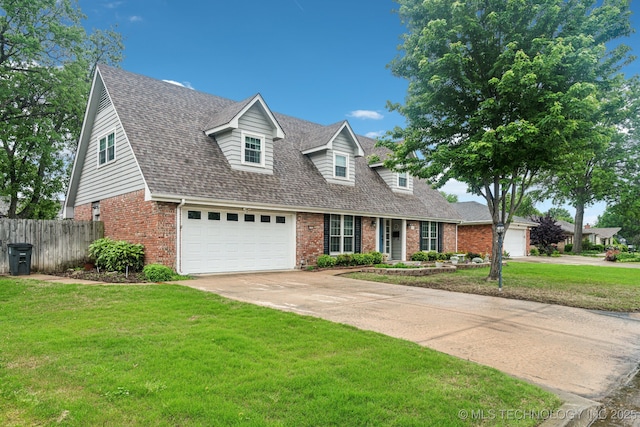 4721 S Irvington Pl, Tulsa, OK 74135 - new england style home with brick siding, concrete driveway, and roof with shingles