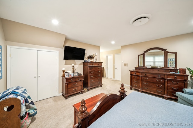 4721 S Irvington Pl, Tulsa, OK 74135 - bedroom with light colored carpet, a closet, and recessed lighting