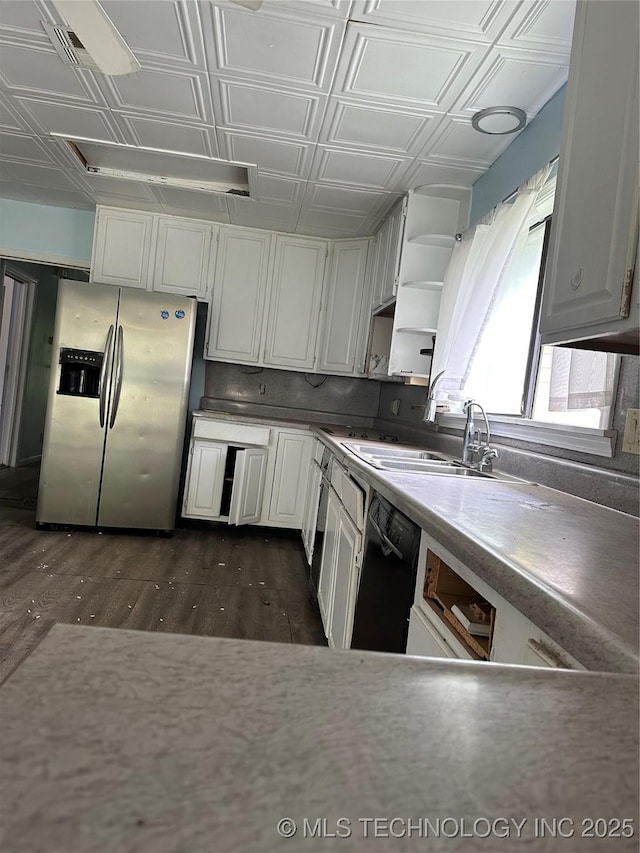 417 E SE, Ardmore, OK 73401 - kitchen with stainless steel refrigerator with ice dispenser, dishwasher, an ornate ceiling, open shelves, and dark wood-type flooring