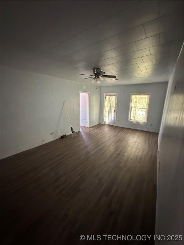 417 E SE, Ardmore, OK 73401 - unfurnished room with wood finished floors and ceiling fan