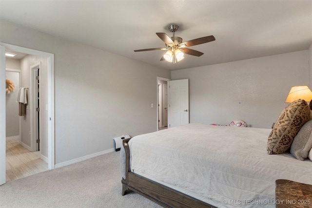 bedroom featuring baseboards, ceiling fan, and carpet floors