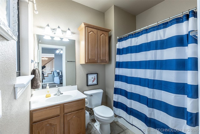 12285 N 164th E Pl, Collinsville, OK 74021 - bathroom featuring vanity, a textured wall, curtained shower, and tile patterned floors