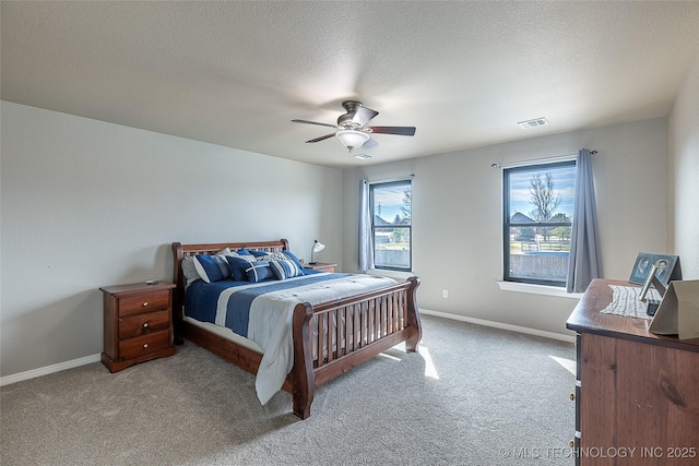 12285 N 164th E Pl, Collinsville, OK 74021 - carpeted bedroom featuring a ceiling fan and a textured ceiling