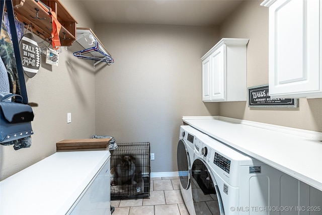 12285 N 164th E Pl, Collinsville, OK 74021 - laundry area featuring washer and clothes dryer, cabinet space, and light tile patterned floors