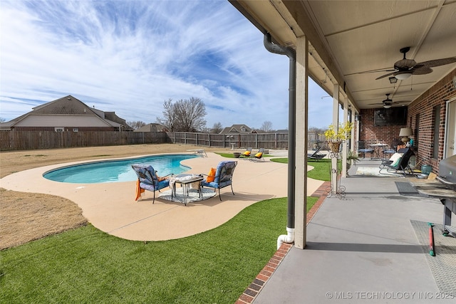 12285 N 164th E Pl, Collinsville, OK 74021 - view of swimming pool featuring a patio, a fenced backyard, and a ceiling fan