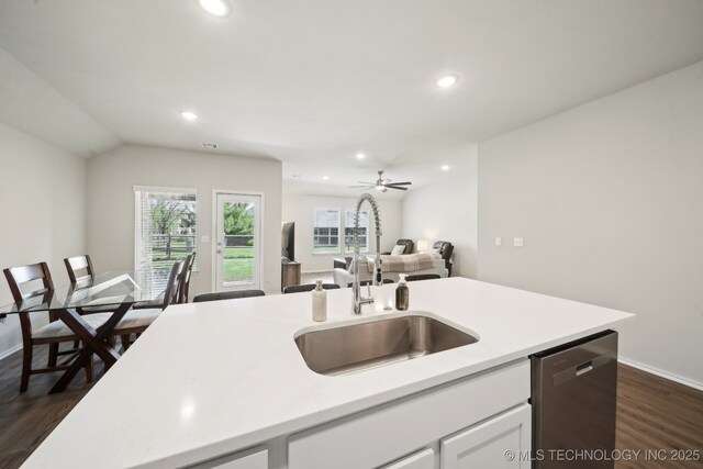 4218 W Village Park Dr, Skiatook, OK 74070 - kitchen featuring recessed lighting, stainless steel dishwasher, a sink, open floor plan, and light countertops