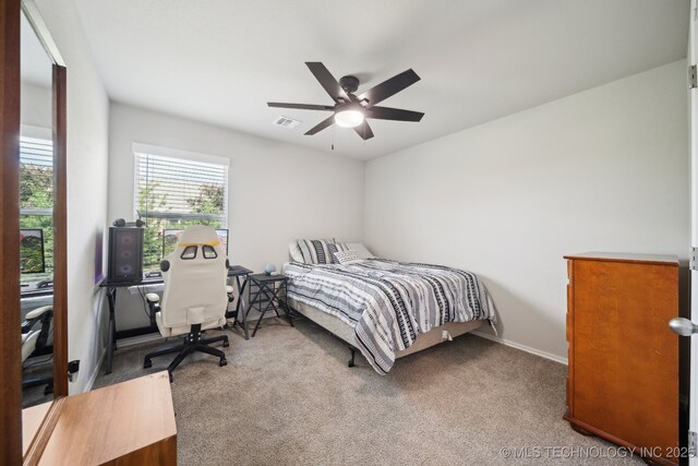 4218 W Village Park Dr, Skiatook, OK 74070 - carpeted bedroom featuring visible vents, baseboards, and ceiling fan
