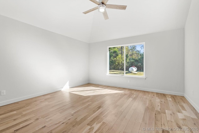 13242 E 4th Pl, Tulsa, OK 74108 - spare room featuring ceiling fan, lofted ceiling, baseboards, and wood finished floors