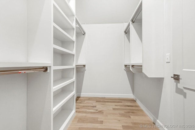 13242 E 4th Pl, Tulsa, OK 74108 - spacious closet with light wood-style flooring