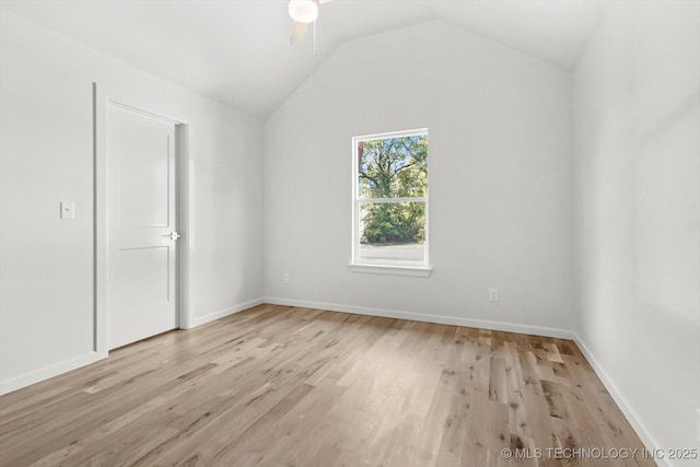 13242 E 4th Pl, Tulsa, OK 74108 - unfurnished room with vaulted ceiling, ceiling fan, baseboards, and light wood-style floors